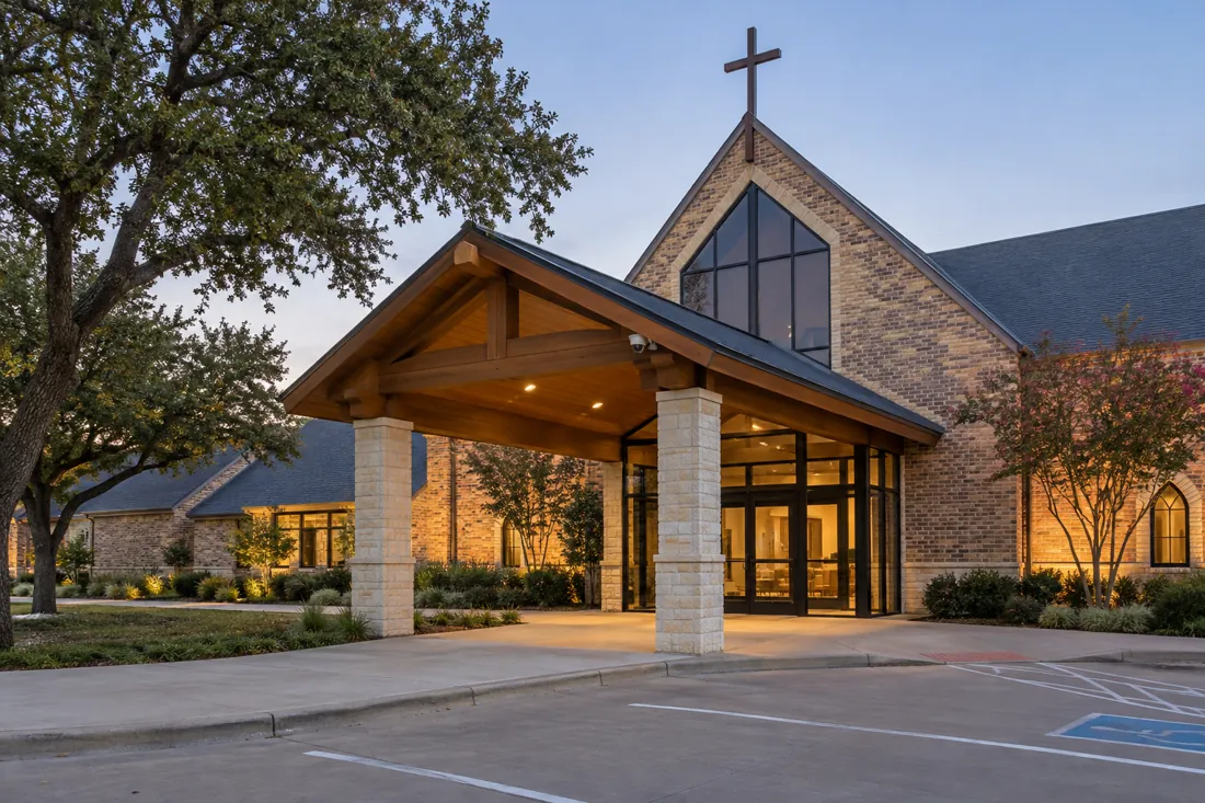 Church entrance with discreet security camera and welcoming covered walkway
